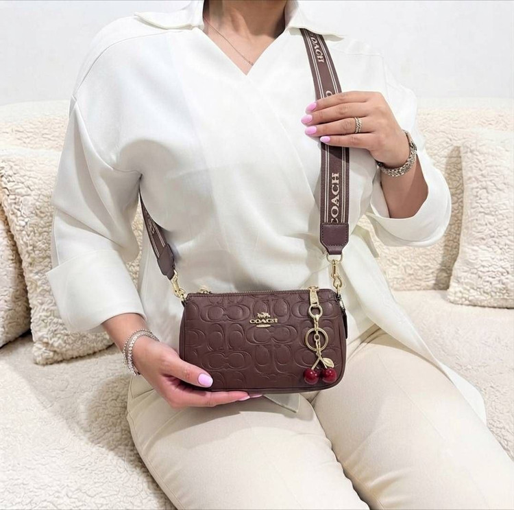کیف دوشی زنانه مارک coach به همراه بند پهن و گیلاس